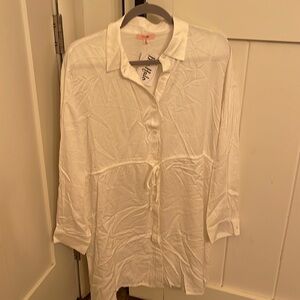 White Dress or wear as /long blouse. Dress up or down with versatile top